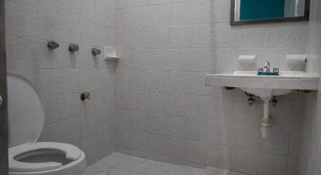 Кровать в общем номере Hotel Posada Aurora