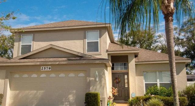 Коттедж 3 Bedroom Home With Private Screened Pool With Rock Waterfall Feature and Gameroom by Florida Dream Homes