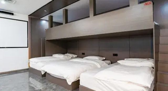 Кровать в общем номере Chongqing Lijiang Alien E-sports Hotel (Grand Cross)