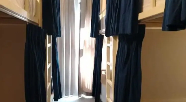 Кровать в общем номере с 4 комнатами TarTar & Nay Hostel