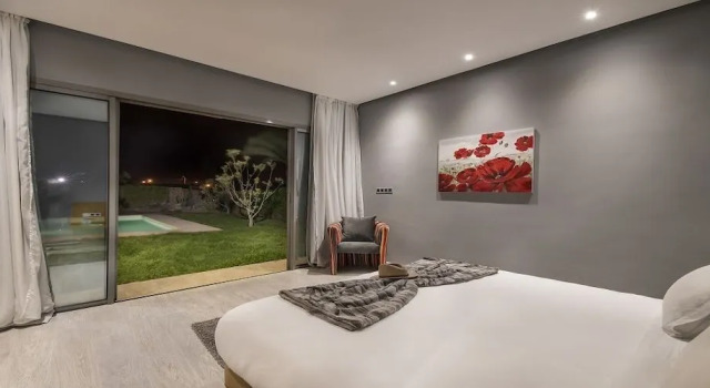 Вилла Deluxe Palms Edge Villas avec Piscine & Jardin Privés