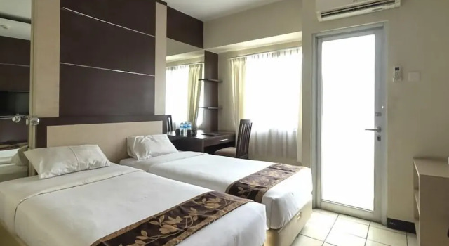 Номер Superior Centro City Service Apartment