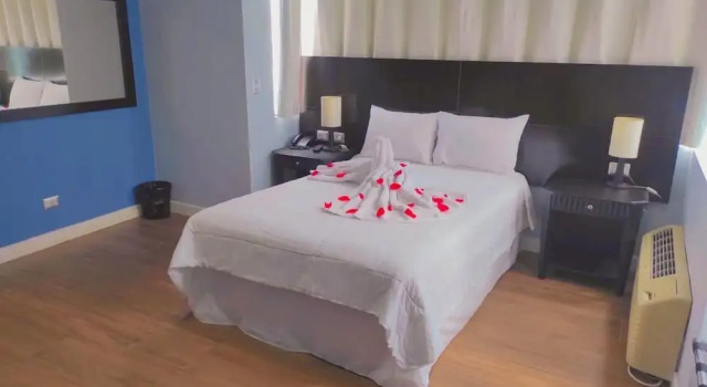 Pat în dormitor Río Boutique Hotel