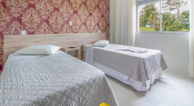 Четырёхместный номер Standard AJ Hotel Chapecó - Fácil Acesso Pátio Shopping e Rótula da Bandeira