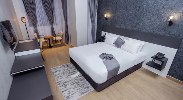 Standard Kahden hengen Perhe huone parvekkeella kaupunkinäköala Shitaye Suite Hotel