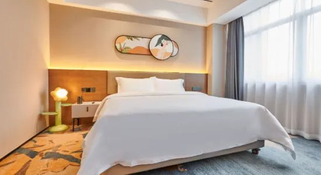 Семейный люкс Rezen Longhh Hotel (Zhaoqing Seven Star Cave Sports Center)