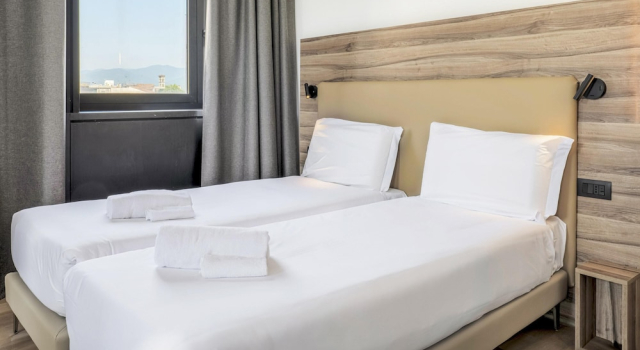 Четырёхместный номер Standard B&B HOTEL Prato City Center