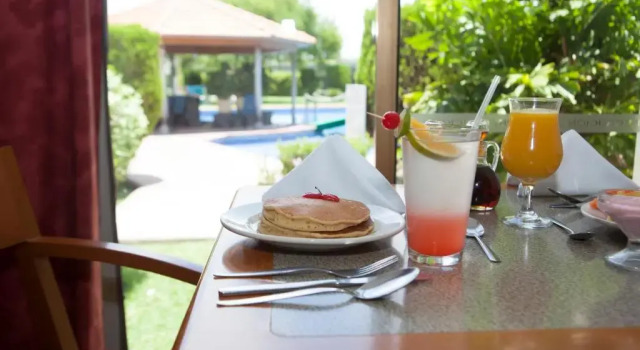 Четырёхместный номер Executive Hotel Paradise Inn