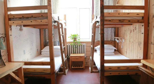 Кровать в общем номере Harbin North International Youth Hostel