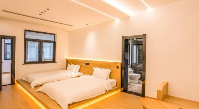 Трёхместный люкс Mogan· Yunlan Holiday Courtyard Boutique Hostel