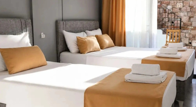 Трёхместный номер Standard с балконом и с видом на сад Kent Otel Ayvalık