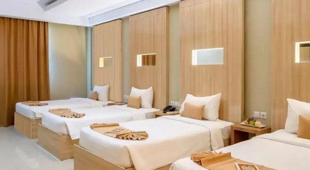 Четырёхместный номер Executive c 1 комнатой Sahid Azizah Syariah Hotel and Convention Kendari