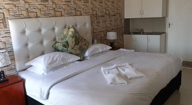 Апартаменты RJs Guesthouse