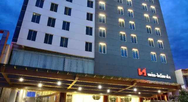 Кровать в общем номере Swiss-Belinn SKA Pekanbaru
