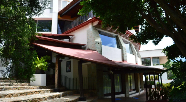 Кровать в общем номере Hotel Victoria Oaxaca