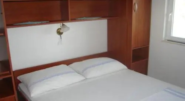 Apartment Slaven, Забронировать Апартаменты/квартира Винишче Trogir Riviera, рядом с Пляж Купиница