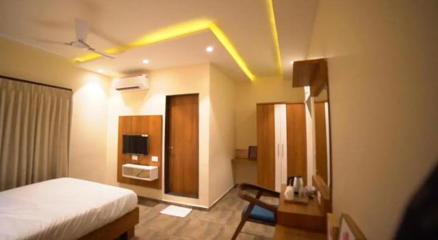 Aananda wellness and resorts, Boek Hotel Hotels en accommodaties in Dharmastala, Hotel
