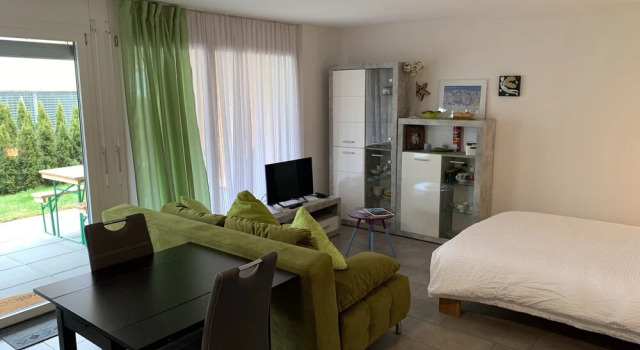 Casita do Lago - Modern Apartment, Забронировать Апартаменты/квартира Лайссиген Lake Thun
