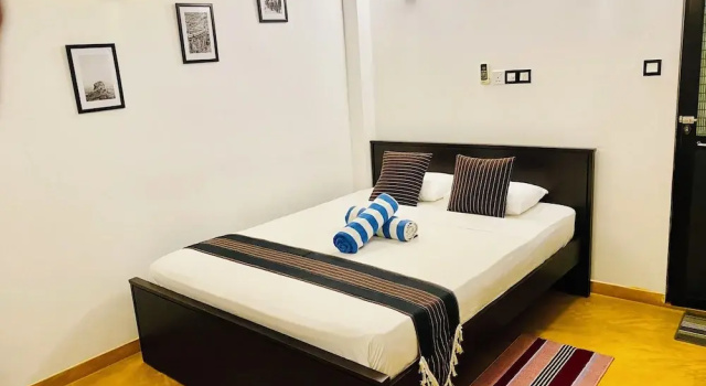 Двухместный номер Deluxe с балконом и с видом на сад Coco Palm Villa and Cabanas