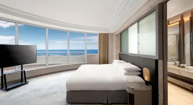 Люкс Deluxe Golden Shining New Century Grand Hotel Beihai