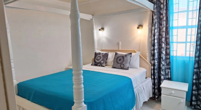 Апартаменты Deluxe с 2 комнатами с балконом Cumber's Tropical Apartments