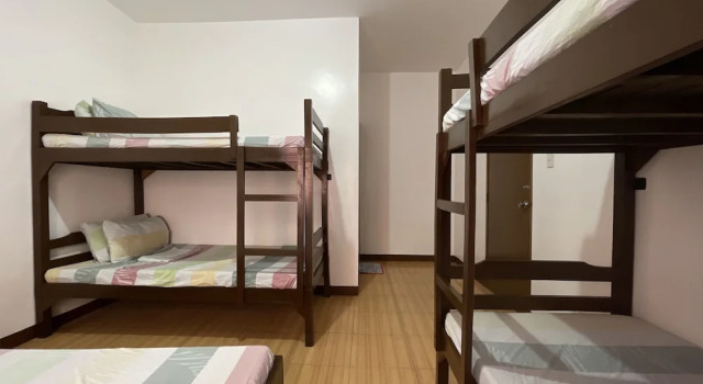 Кровать в общем номере Poracay Resort