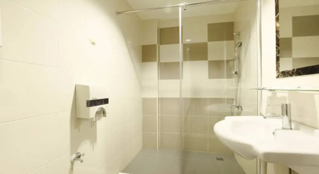 Кровать в общем номере Huaxiang Motel - K Arena