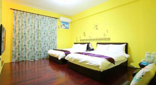 Standardowy czteroosobowy pokój i balkonem Yi Homestay