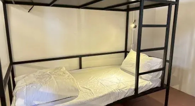 Кровать в общем номере WD Kuixing Backpacker Hostel