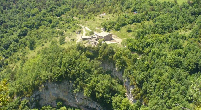 Кровать в общем номере Mas rural El Negre