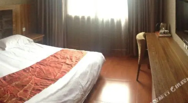 Xichang Qinghua Business Hotel, Prenota Hotel Xichang Sichuan