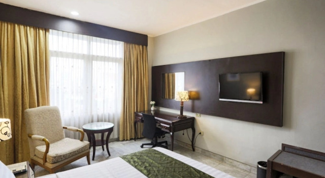 Номер Deluxe Johns Pardede International Hotel