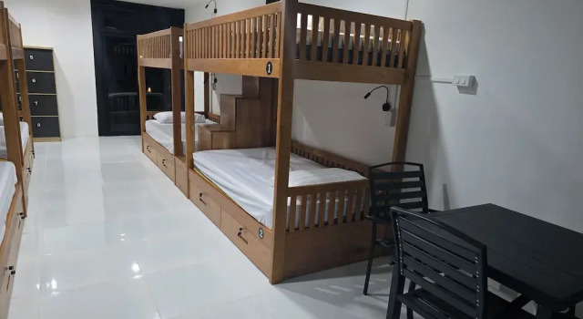 Кровать в общем номере Sasitara Residence