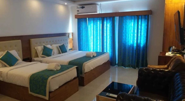 Трёхместный номер Luxury Hotel De Pebbles
