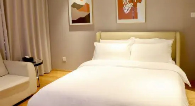 Двухместный люкс Wanyi Hotel