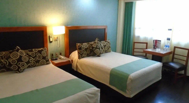 Четырёхместный номер Standard Hotel Abastos Plaza