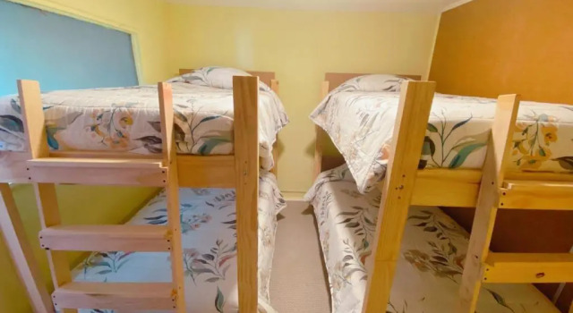 Кровать в общем номере Indomito Sur Hostel