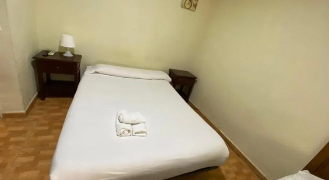 Трёхместный номер Hostal Los Perales