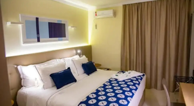 Номер Deluxe House Inn Hotel