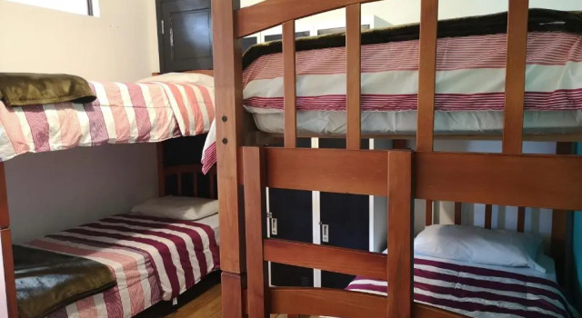 Кровать в общем номере Hostal Vitalia