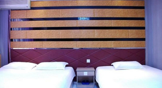 Mudanjiang Jingbo Renjia Hotel, Varaa Hotelli Mudanjiang Heilongjiang