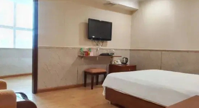 Четырёхместный люкс Standard Jiangfan Hotel