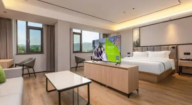 Люкс Deluxe GreenTree Inn Smart Selection Hotel (Mengyang Bus Terminal Branch, Jinghong City)