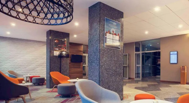 Кровать в общем номере Mercure Czestochowa Centrum