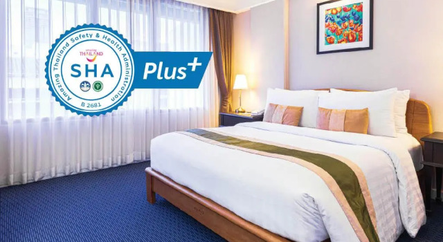 Кровать в общем номере Le Siam Hotel Silom Bangkok by PCL