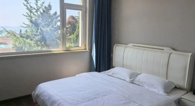 Семейный люкс с видом на море Qingdao Kaishan Yishu Homestay (Laoshan)