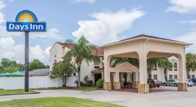 Кровать в общем номере Motel 6 Houma, LA
