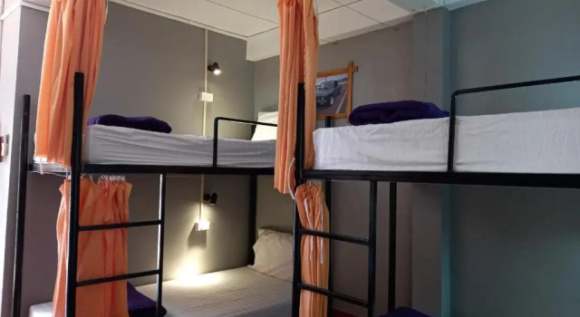 Кровать в общем номере Riverside Garden Hostel