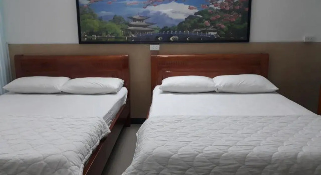 Кровать в общем номере Thanh Lan Hotel
