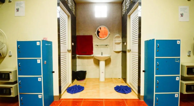 Кровать в общем номере Nids Bungalows